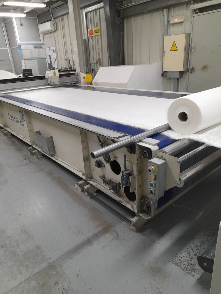 eastman-machine-cutting